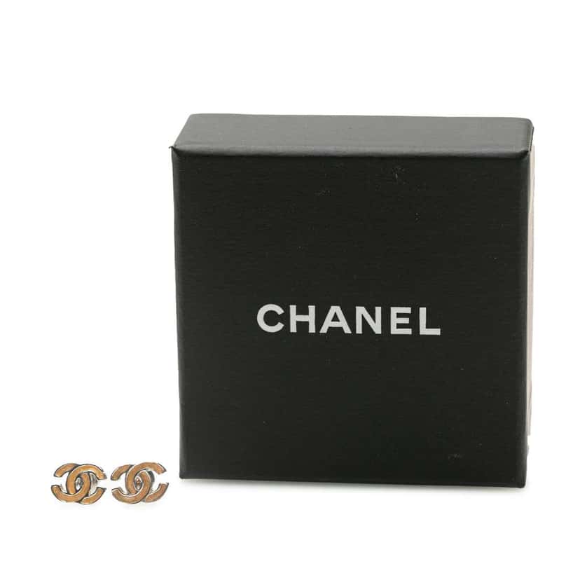 Chanel Silver CC Push Back Earrings Silver Silver Good condition - Model View