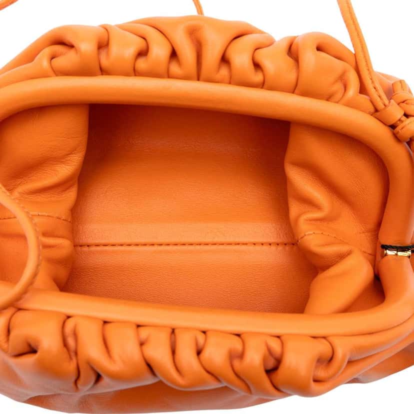 Bottega Veneta Lambskin The Mini Pouch Crossbody Orange Leather Good condition - Model View