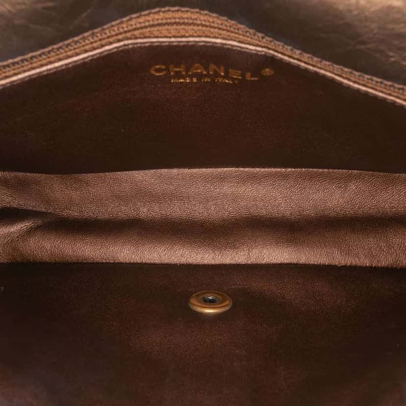 Chanel Paris Dallas Metallic Calfskin Embossed Logo Flap Brown Leather Good condition - Model View