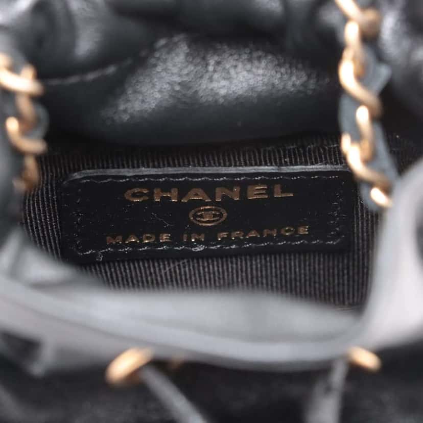 Chanel Mini Quilted Calfskin Drawstring Bucket Bag Black Leather Good condition - Model View
