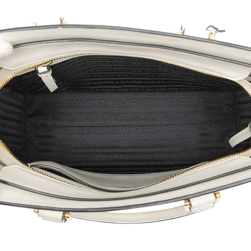 Prada Small Soft Calf Trimmed Saffiano Zippered Tote White Leather Good condition - Model View