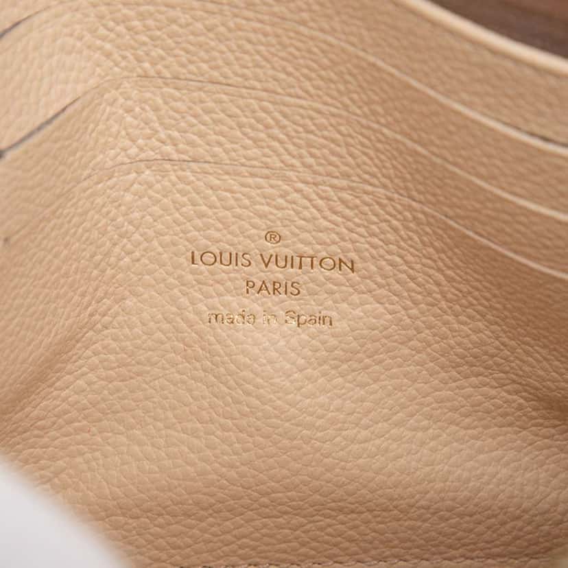 Louis Vuitton Monogram Empreinte Double Zip Pochette Brown Leather Good condition - Box View