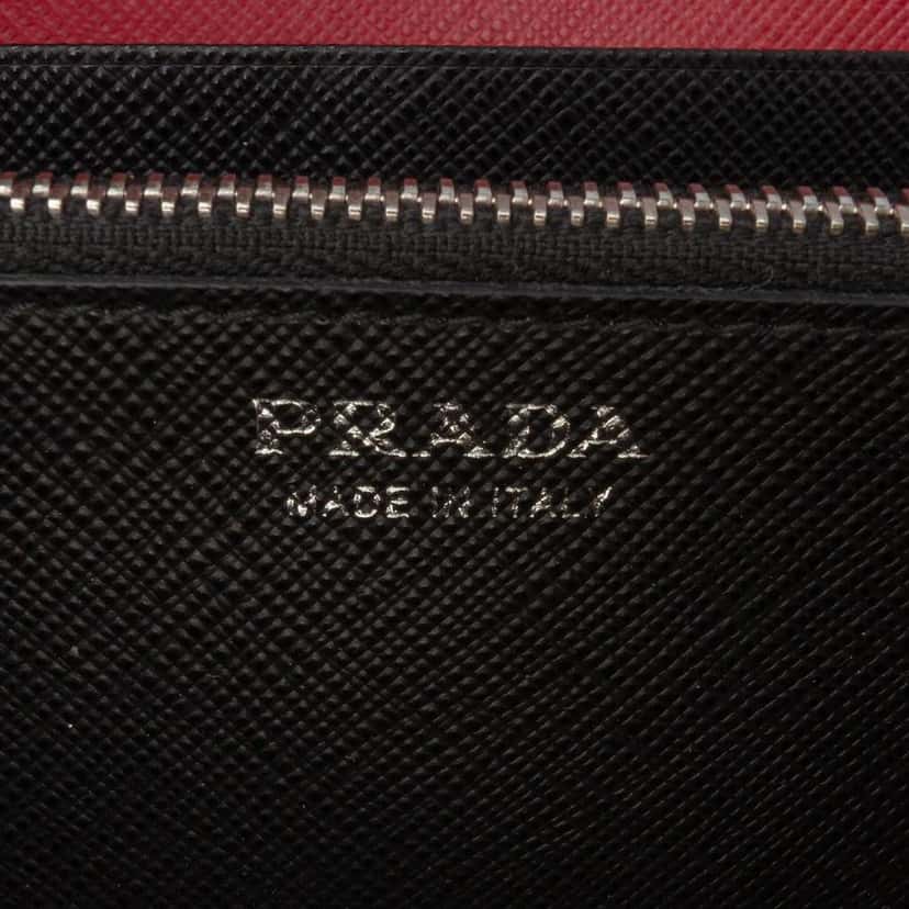 Prada Saffiano Grommet Wallet Red Leather Good condition - Box View