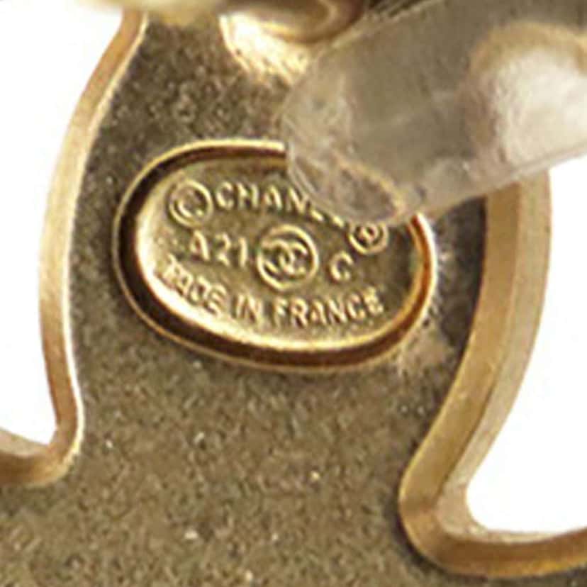 Chanel Gold Plated CC Crystal Push Back Earrings Gold Metal Good condition - Model View