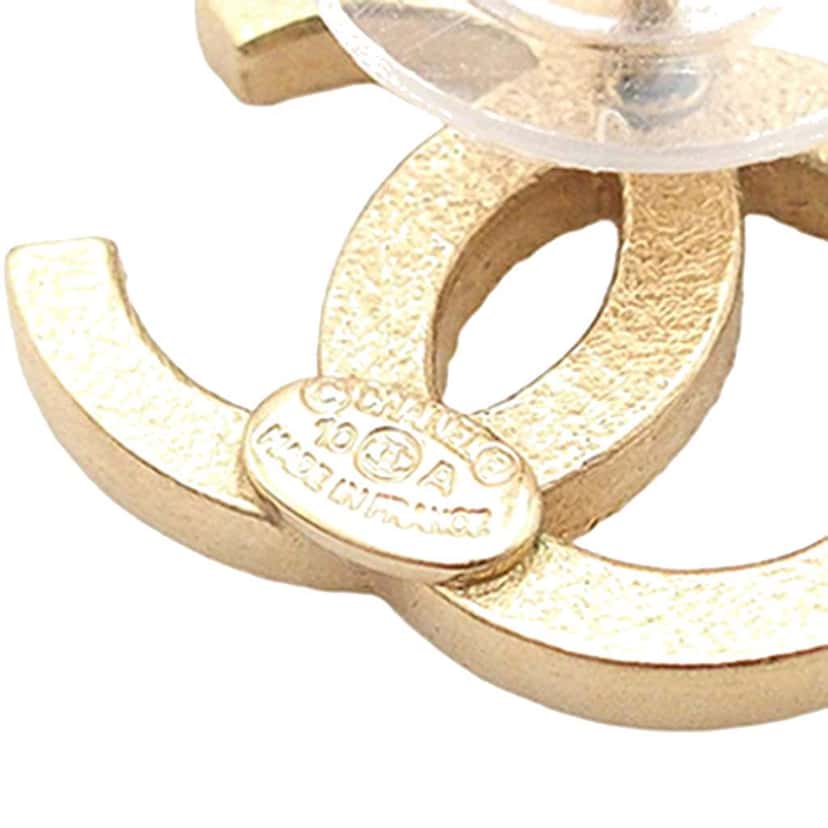Chanel Gold Plated CC Rhinestones Push Back Earrings Gold Metal Good condition - Model View