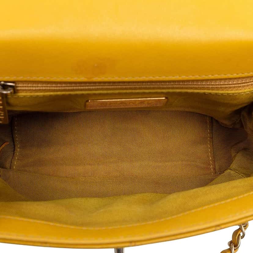 Chanel Small Quilted Lambskin Chain Infinity Top Handle Bag Yellow Leather Very good condition - Model View