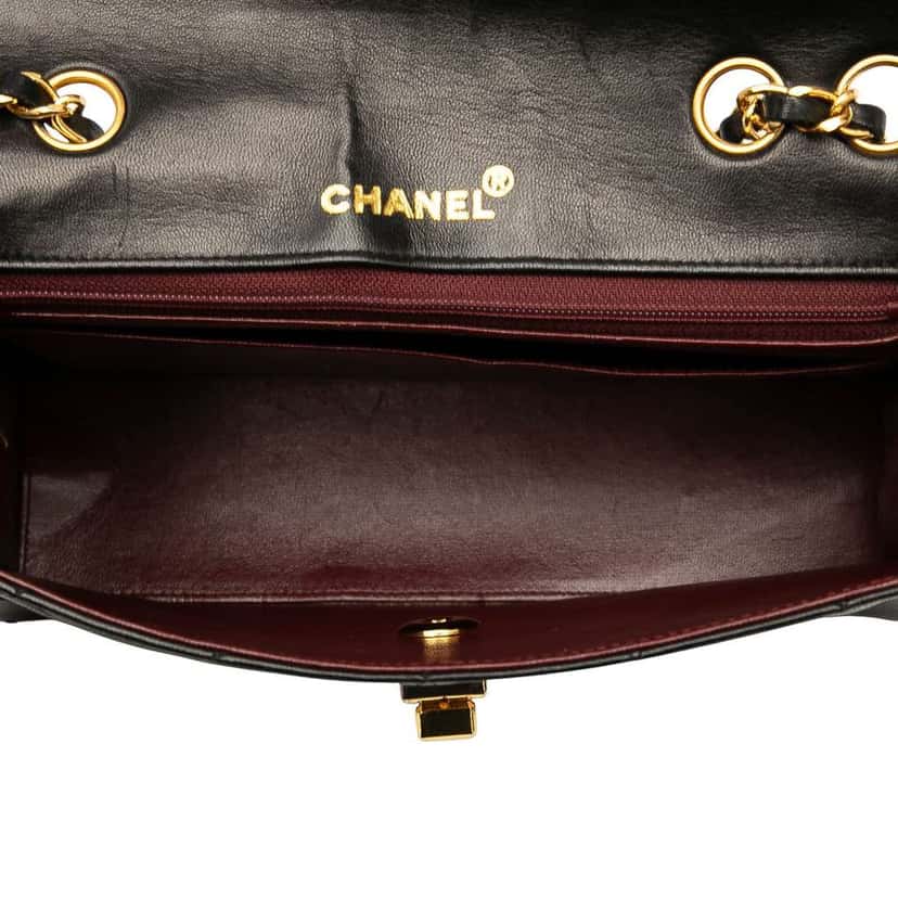 Chanel Medium Quilted Lambskin Mademoiselle Single Flap Black Leather Good condition - Model View