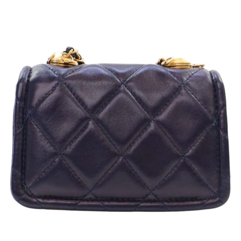 Chanel Mini Quilted Shiny Lambskin Button On Top Flap Blue Leather Good condition - Model View
