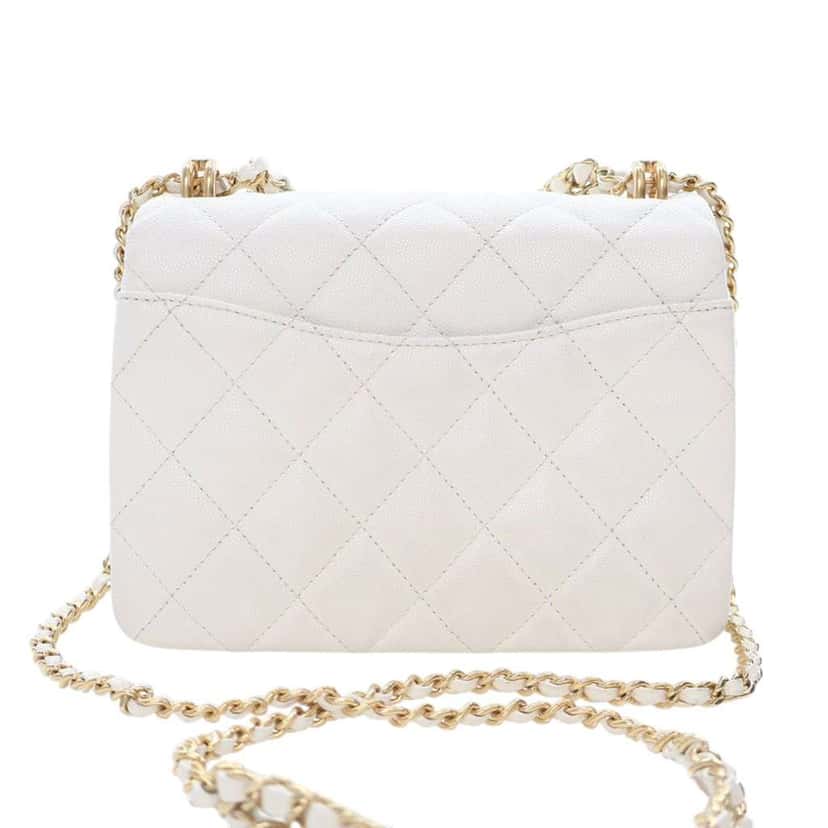 Chanel Mini Quilted Caviar Coco First Flap White Leather Good condition - Model View