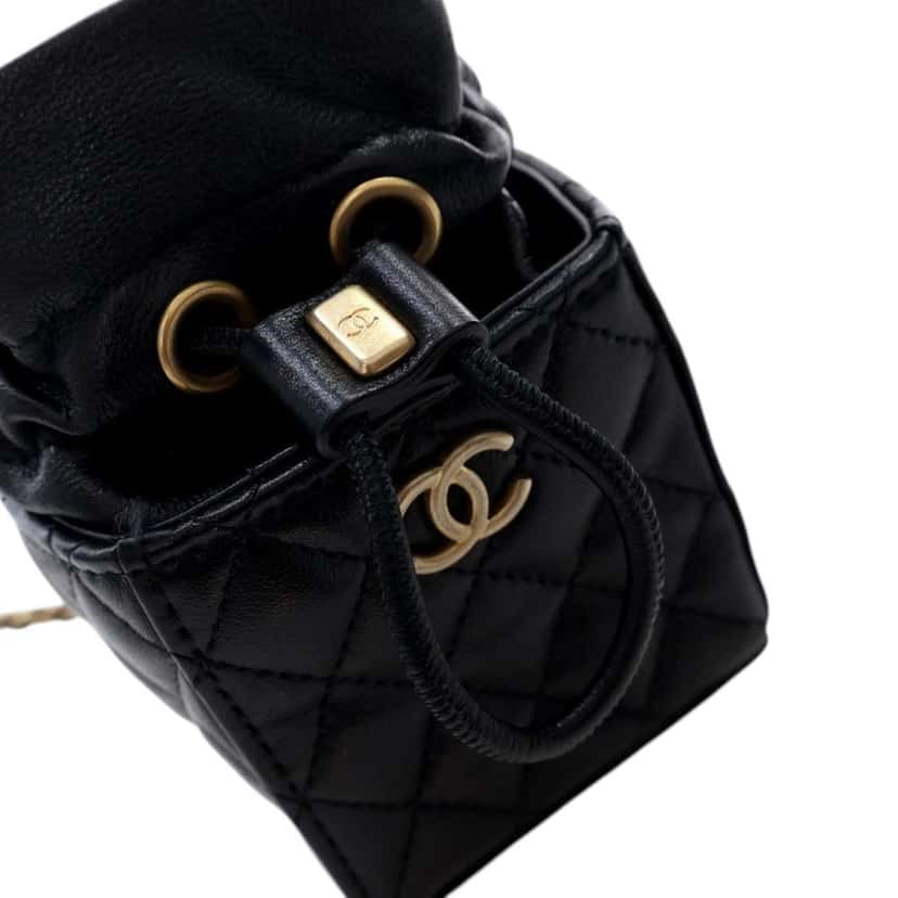 Chanel Mini Quilted Calfskin Drawstring Bucket Bag Black Leather Good condition - Model View