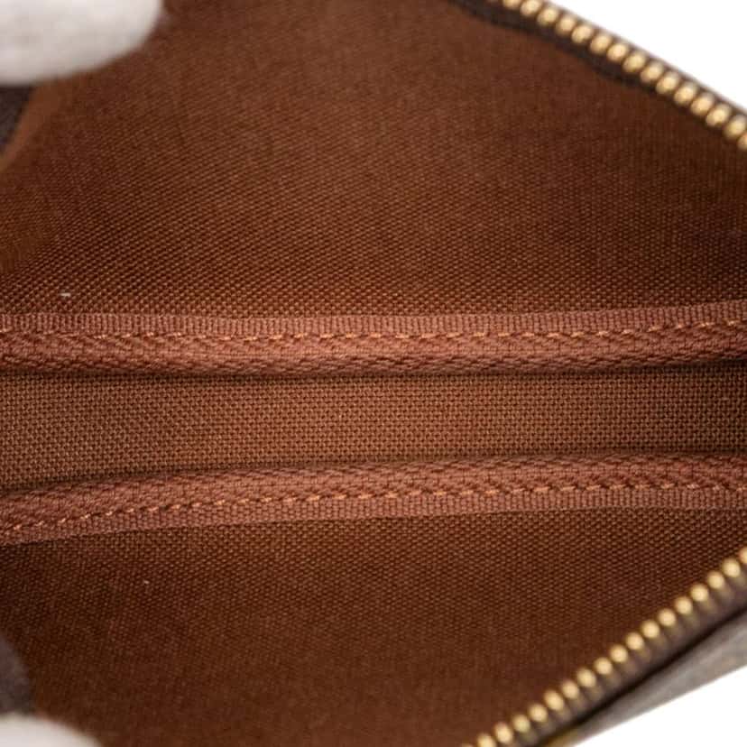 Louis Vuitton Monogram Evasion Illustre Mini Pochette Accessories Brown Good condition - Model View