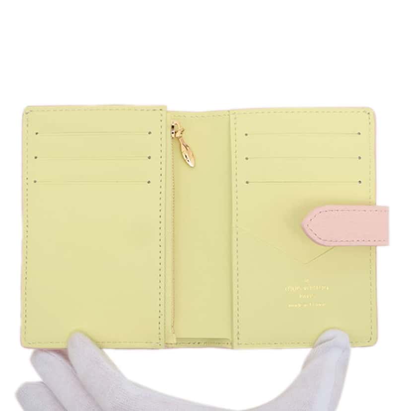 Louis Vuitton Taurillon Capucines  Vertical Compact Wallet Pink Leather Good condition - Model View