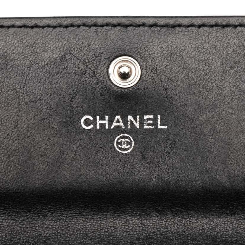 Chanel CC Embossed Calfskin Camellia Flap Wallet Black Leather Good condition - Box View