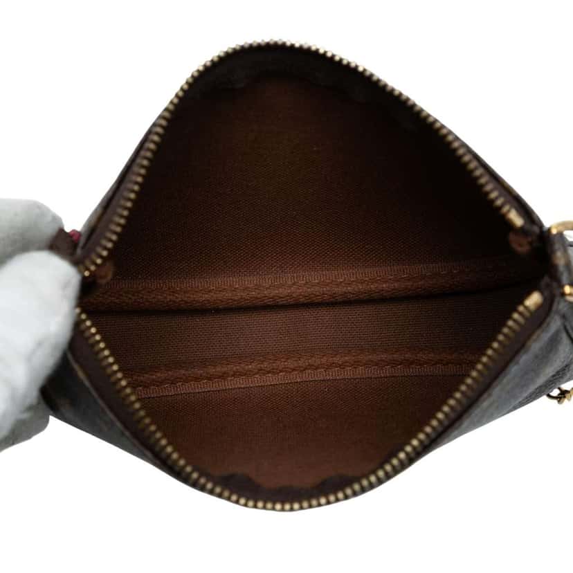 Louis Vuitton Monogram Giraffe Christmas Mini Pochette Accessoires Brown Good condition - Model View