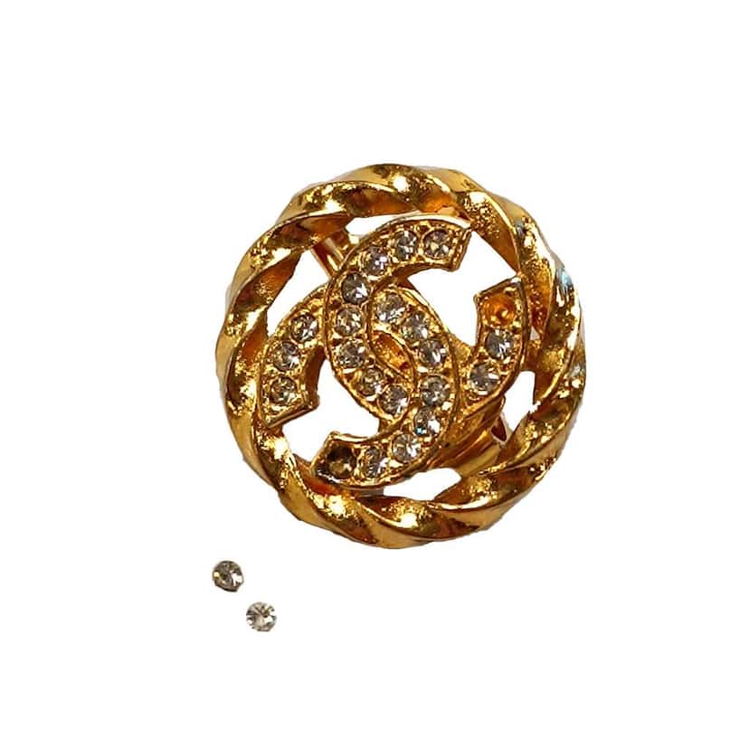 Chanel Gold Plated CC Crystal Clip On Earrings Gold Metal Good condition - Model View