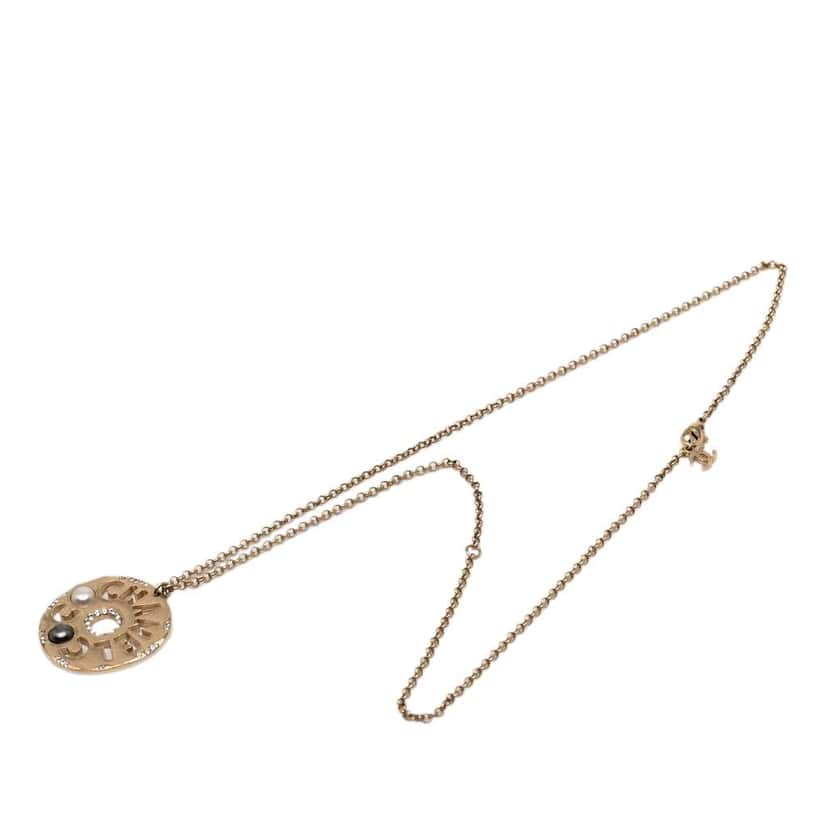 Chanel Gold Plated Faux Pearl and Rhinestone Logo Pendant Necklace Gold Metal Good condition - Model View