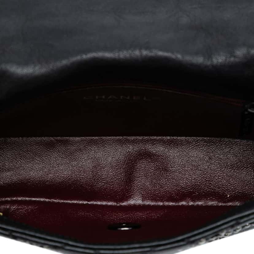 Chanel Small Quilted Distressed Calfskin Studded Metal Beauty Flap Black Leather Good condition - Model View