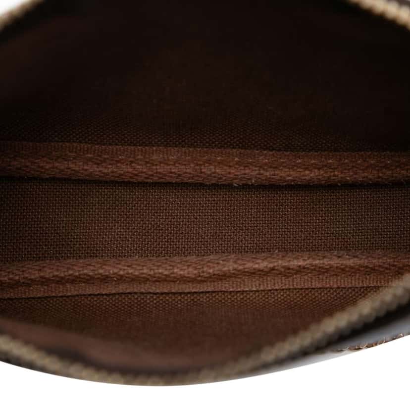 Louis Vuitton Monogram Evasion Illustre Mini Pochette Accessories Brown Good condition - Model View