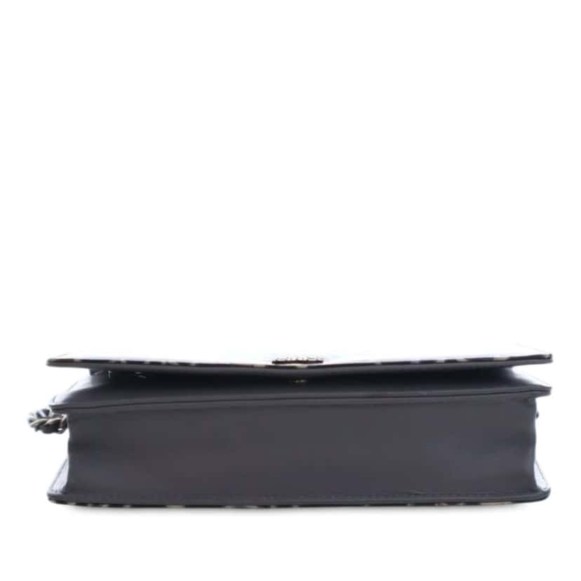 Chanel CC Embossed Patent Camellia Wallet On Chain Blue Leather Good condition - Model View