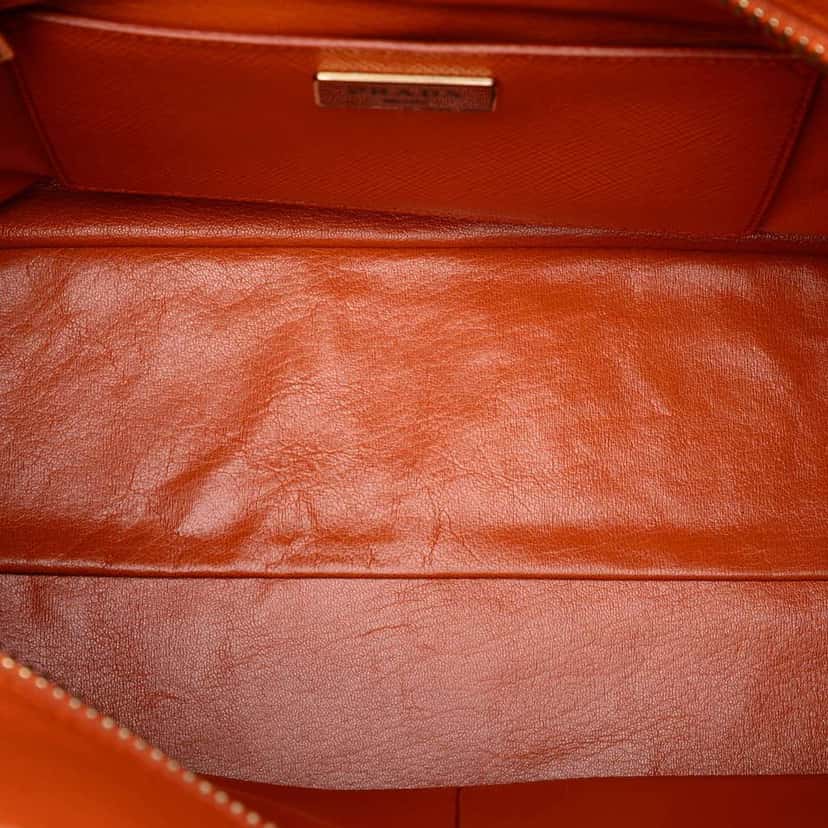 Prada Saffiano Cuir Triple Zip Dome Top Handle Bag Orange Leather Good condition - Model View