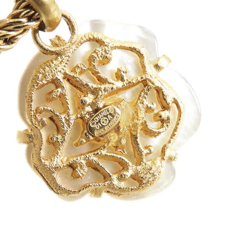 Chanel Gold Plated Mother of Pearl Camellia Pendant Necklace Gold Metal Good condition - Model View