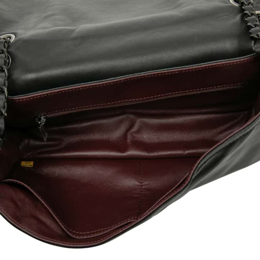 Chanel Large CC Quilted Lambskin and Shearling Single Flap Black Leather Good condition - Model View