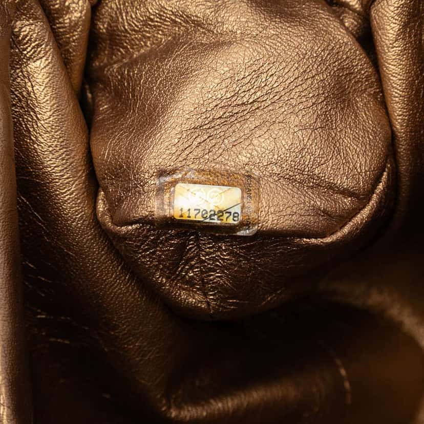 Chanel Metallic Crackled Calfskin Monte Carlo Clutch Gold Leather Very good condition - Box View