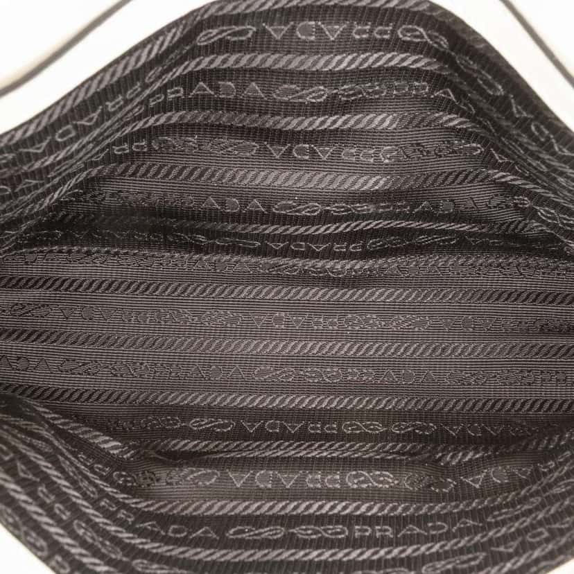 Prada Saffiano Triangle Embossed Logo Flap Crossbody White Leather Good condition - Model View