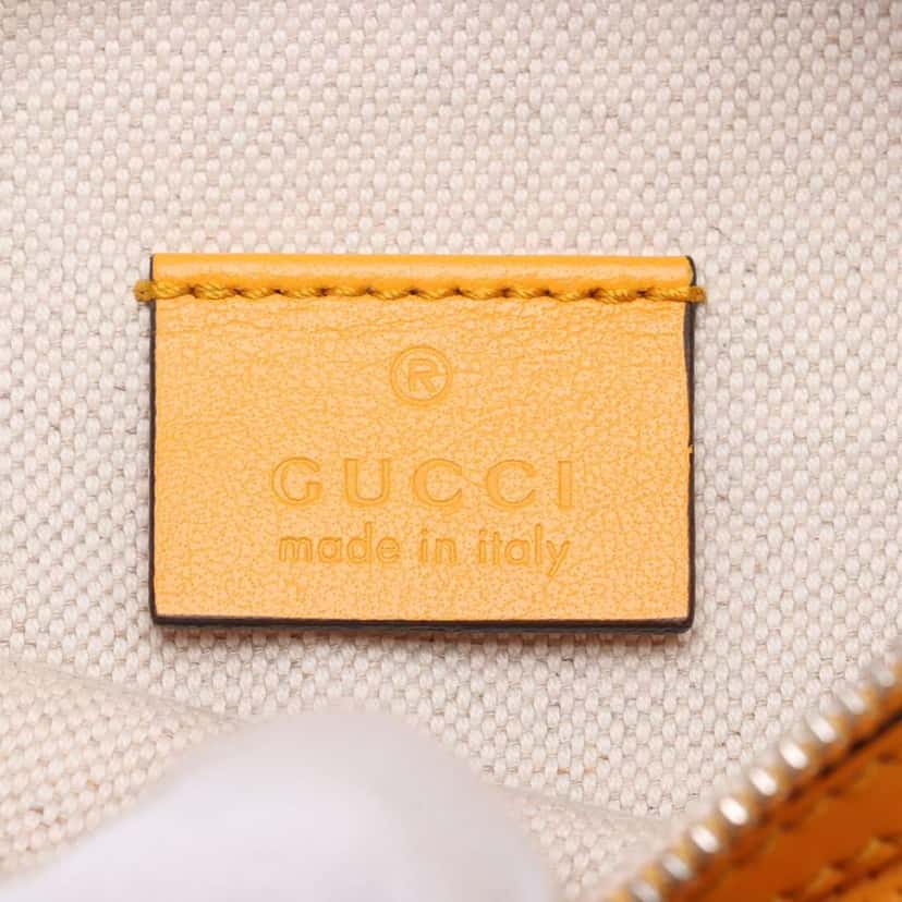 Gucci GG Embossed Belt Bag Yellow Leather Good condition - Model View
