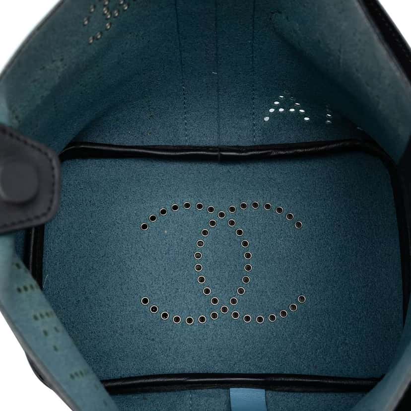 Chanel Small Perforated Calfskin Logo Eyelet Bucket Bag Black Leather Very good condition - Model View