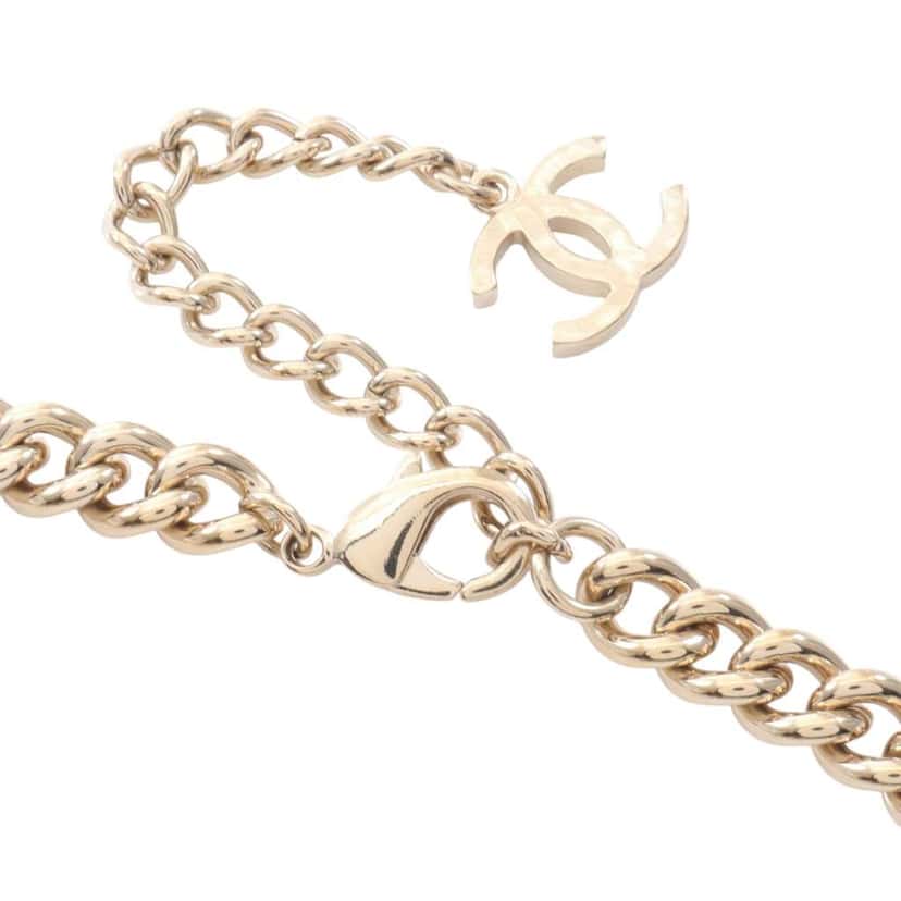 Chanel Gold Plated Crystal Star and Logo Pendant Necklace Gold Metal Good condition - Model View