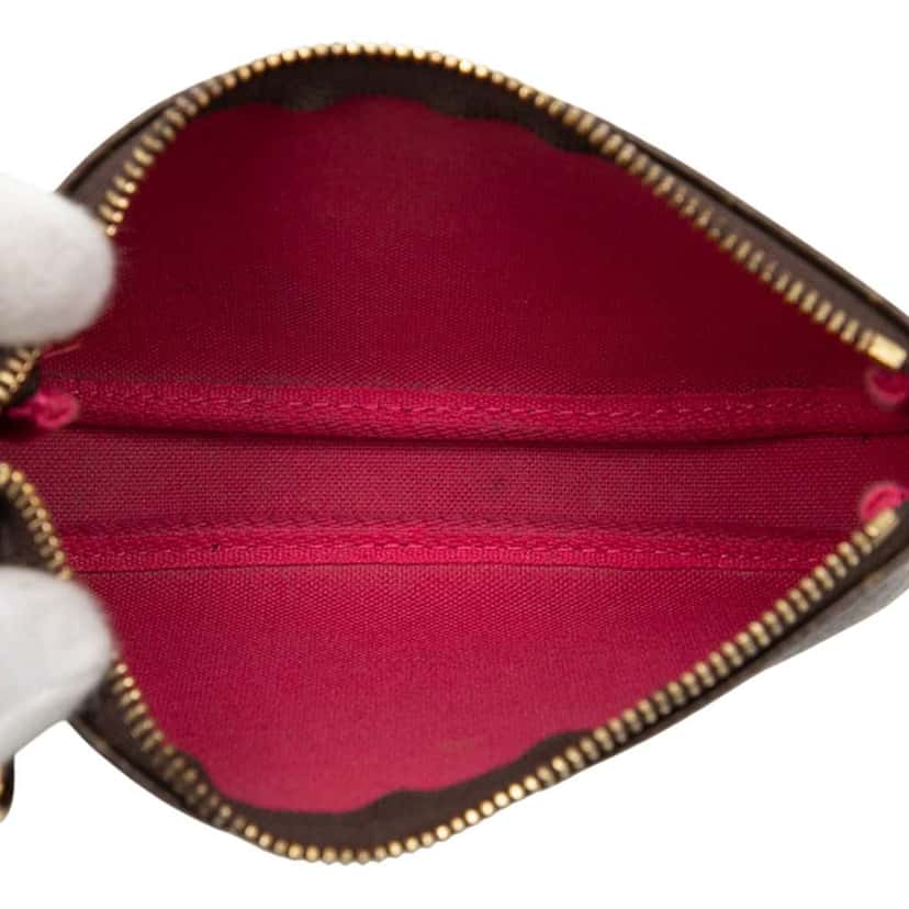 Louis Vuitton Monogram Vivienne Christmas Roller Coaster Mini Pochette Accessoires Brown Good condition - Model View