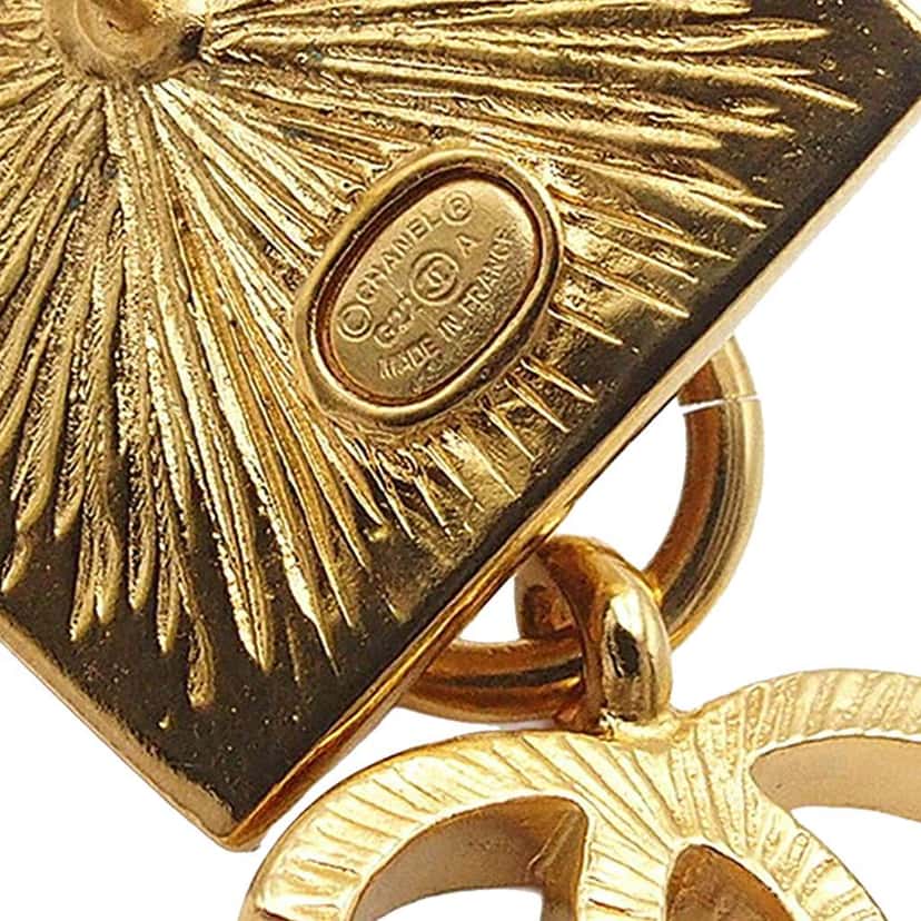 Chanel Gold Plated Lion Head CC Drop Push Back Earrings Gold Metal Good condition - Model View