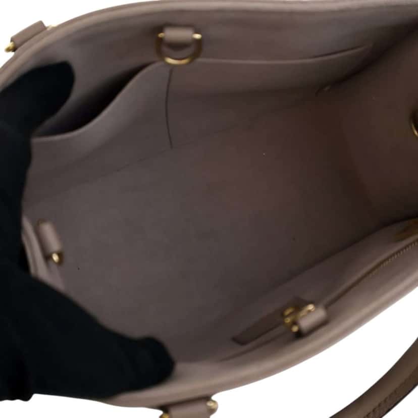 Louis Vuitton Bicolor Monogram Empreinte Giant OnTheGo PM Brown Leather Good condition - Box View