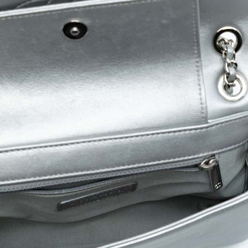 Chanel Mini Quilted Chevron Sheepskin Mademoiselle Vintage Flap Silver Leather Good condition - Model View