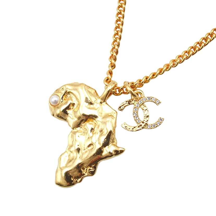 Chanel Gold Plated CC Faux Pearl and Rhinestone Africa Pendant Necklace Gold Metal Good condition - Back View