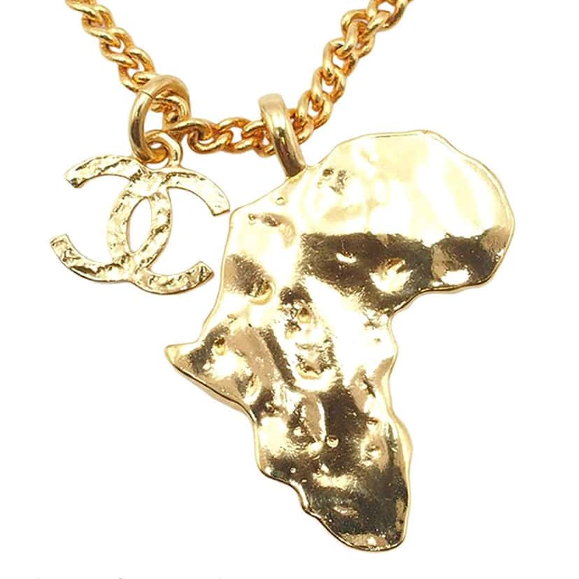 Chanel Gold Plated CC Faux Pearl and Rhinestone Africa Pendant Necklace Gold Metal Good condition - Model View