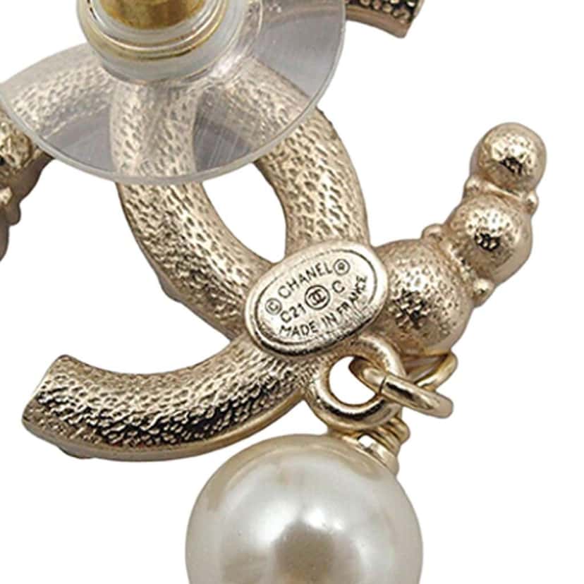Chanel Gold Plated CC Crystal and Faux Pearl Drop Push Back Earrings Gold Metal Good condition - Model View