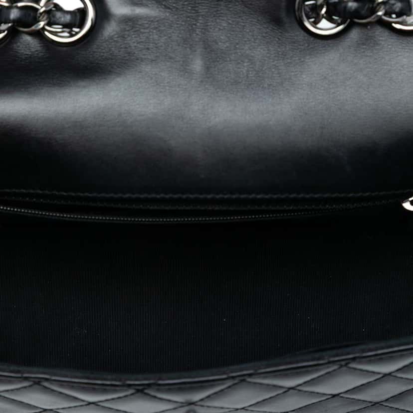 Chanel Small Quilted Lambskin Mademoiselle Chic Flap Black Leather Good condition - Model View