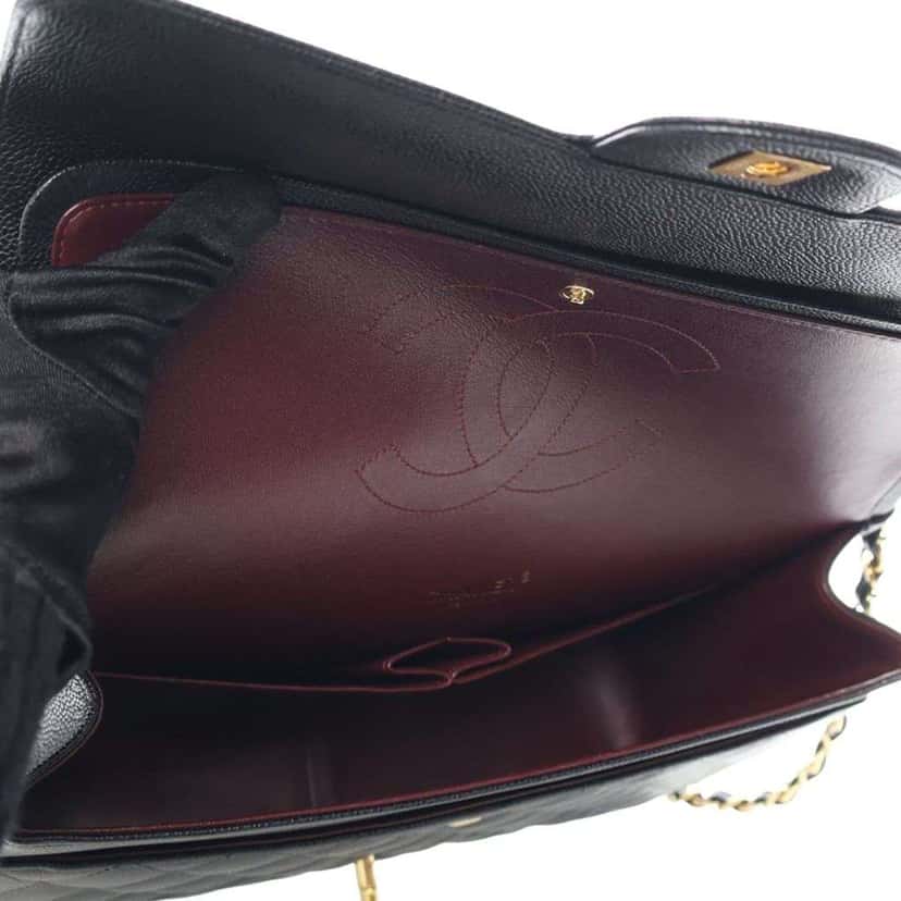Chanel Maxi Classic Caviar Double Flap Black Leather Good condition - Model View