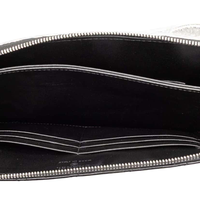 Chanel Quilted Metallic Lambskin Wave Clutch Silver Leather Good condition - Model View