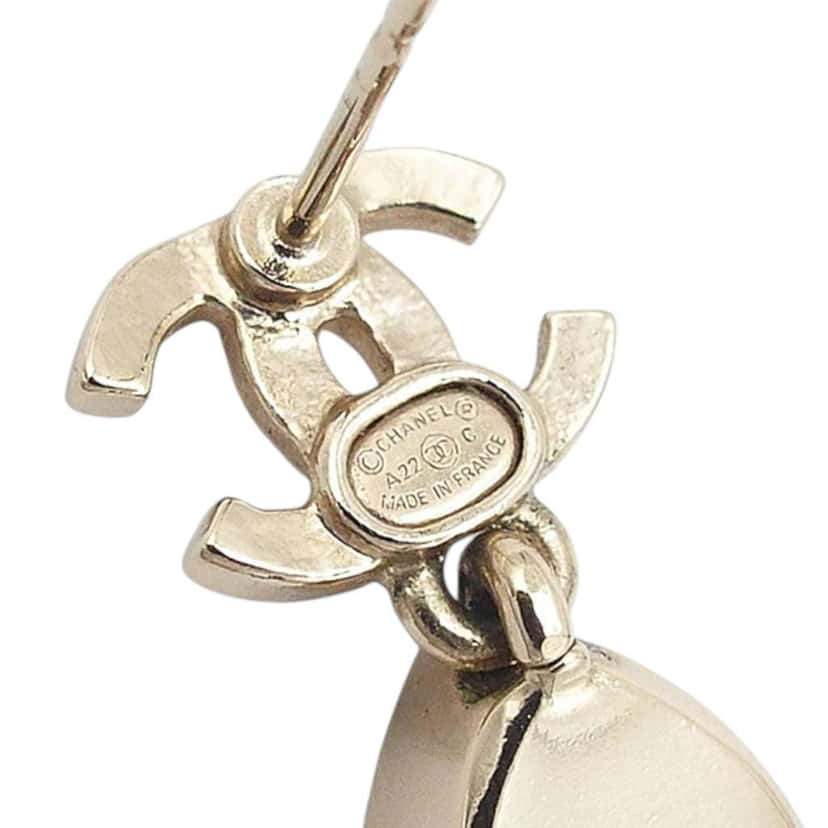 Chanel CC Gold Plated Crystal Drop Push Back Earrings Gold Metal Good condition - Model View