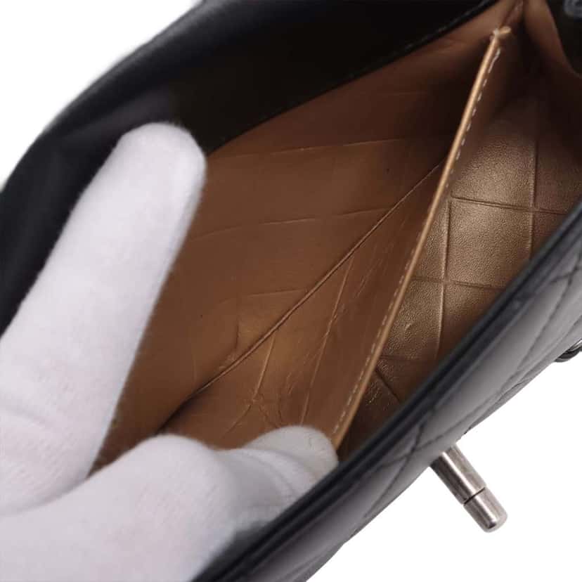 Chanel Mini Quilted Lambskin Coco Clips Flap Black Leather Good condition - Model View