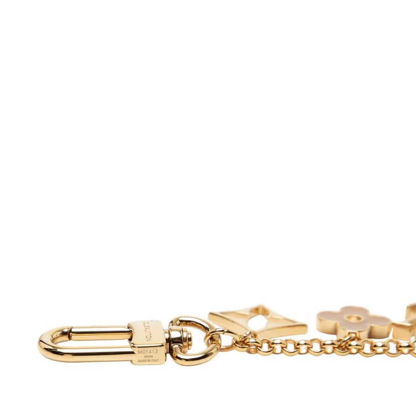 Louis Vuitton Gold Plated Fleur de Monogram Bag Charm Gold Metal Good condition - Model View