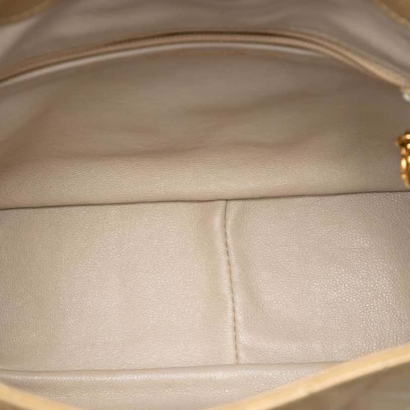 Chanel Quilted Lambskin CC Fold Over Crossbody Gold Leather Good condition - Model View
