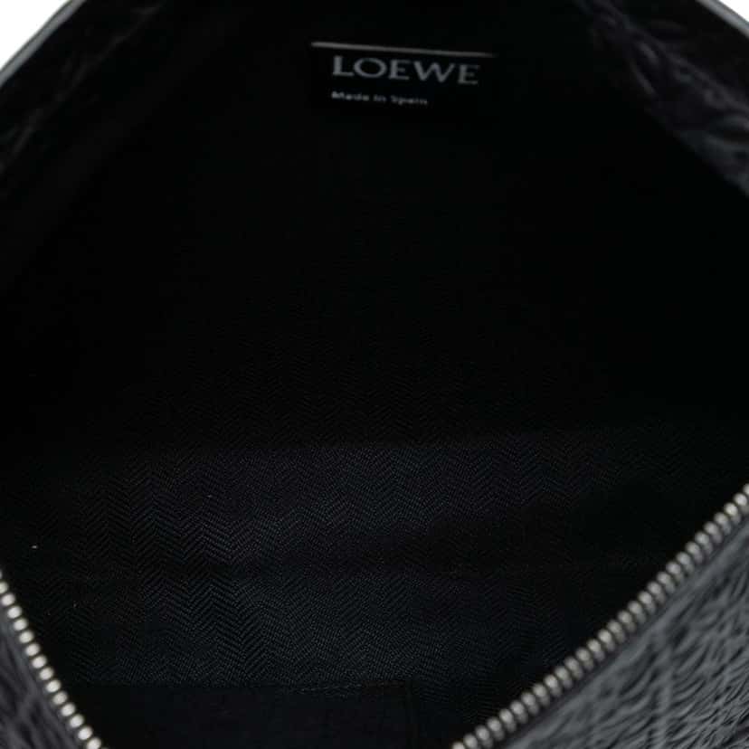 Loewe Embossed Anagram Leather Repeat T Clutch Black Leather Good condition - Model View