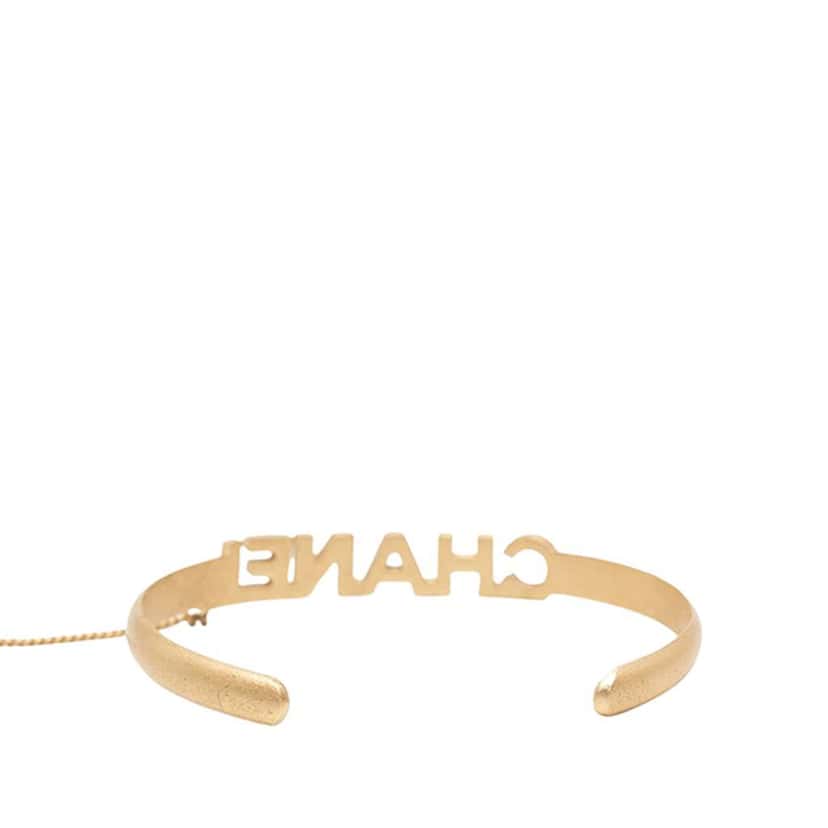 Chanel CC Gold Plated Rhinestone Logo Cuff Bracelet and Ring Set Gold Metal Very good condition - Model View