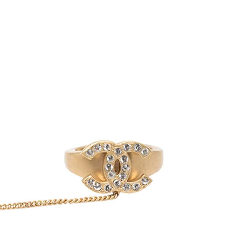 Chanel CC Gold Plated Rhinestone Logo Cuff Bracelet and Ring Set Gold Metal Very good condition - Box View