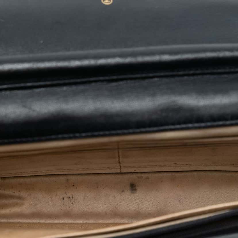 Chanel CC Embossed Lambskin Camellia Wallet On Chain Black Leather Good condition - Model View
