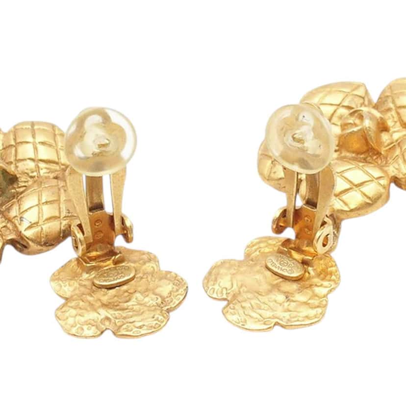 Chanel Gold Plated Quilted Camellia Drop Clip on Earrings Gold Metal Good condition - Model View